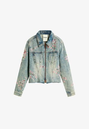 Light blue denim jacket with front zipper, two chest pockets, and pink floral embroidery on sleeves and front panels.