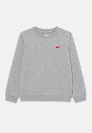 Sweatshirt gris en coton avec des manches longues, des poignets côtelés, un col rond et un petit logo rouge Levi's sur la poitrine.