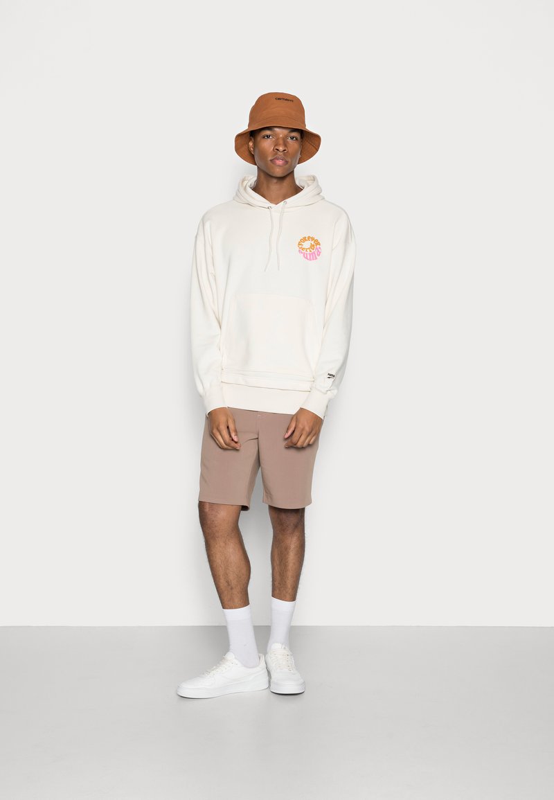 Puma DOWNTOWN GRAPHIC HOODIE - Mikina - ivory glow
