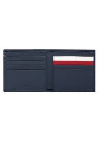 Navy leather wallet with multiple card slots; interior features red, white, and blue stripe details. Smooth texture, minimal branding.