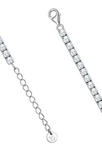 Sudraba aproce ar skaidru, apaļu akmeņu rindu, ar omāru sprādzi un regulējamu ķēdes posmu.