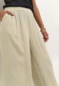 Kaffe DACIA AMBER - Trousers - feather gray