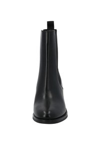 Black leather Chelsea boots with a sleek design, elastic side panels, and a pull tab at the back. Low stacked heel and smooth texture.