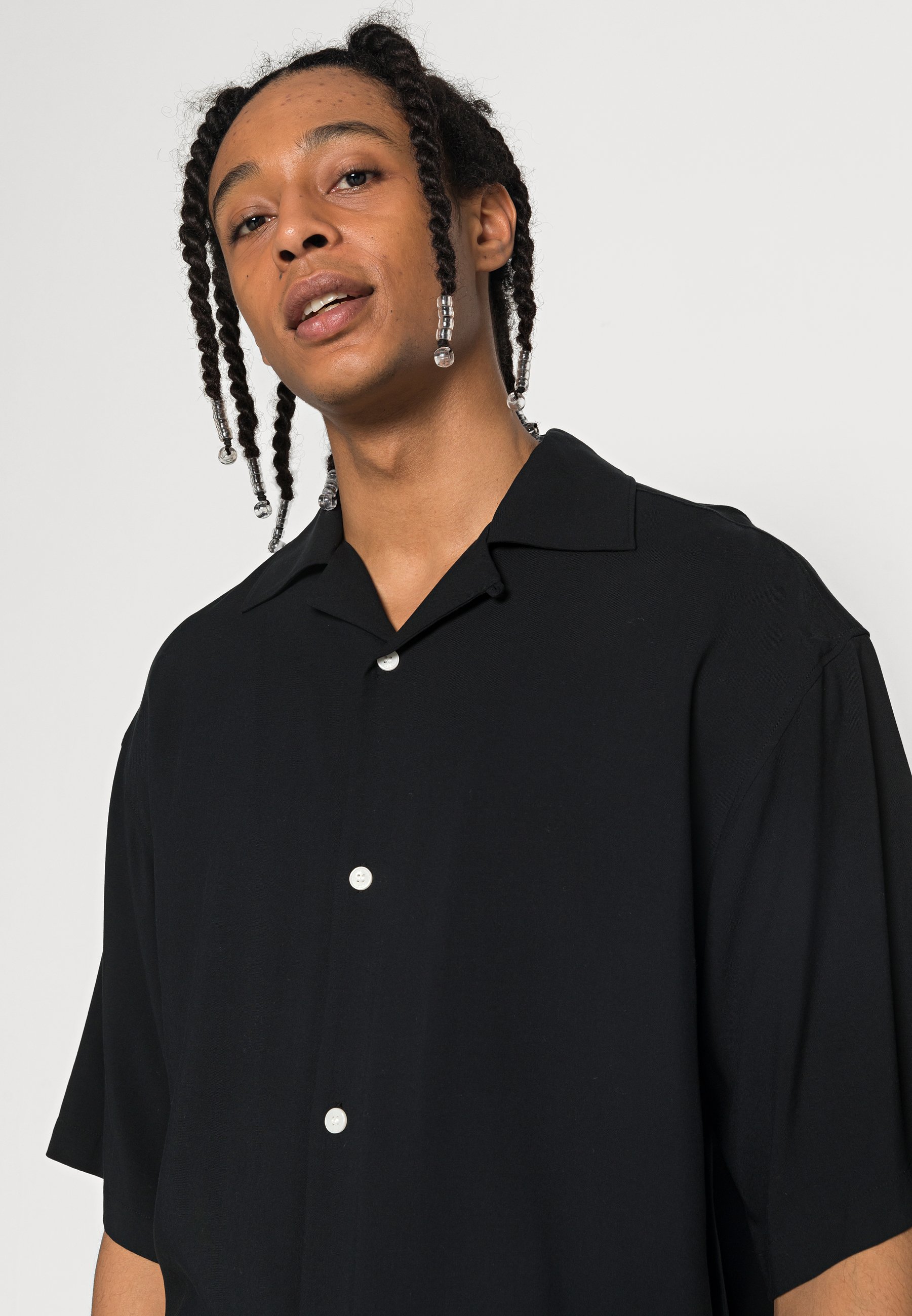 black oversized button up