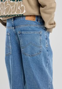 America Today DAYTON  - Flared Jeans - denim blue
