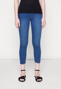 Marks & Spencer JEGGINGS - Calças de ganga de corte skinny - medium indigo