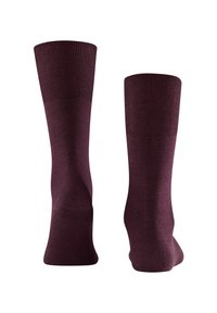 Calze fino al ginocchio bordeaux con parte superiore a coste, texture liscia e design senza cuciture. Realizzate in tessuto morbido per comfort e durata.