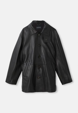 Black leather coat with a collar, button closure, two front pockets, and a textured finish. Features a tag on the collar for brand identification.