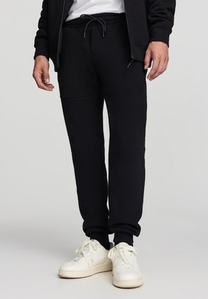 GINNICI TECNICO - Pantaloni sportivi - nero