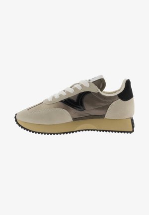 Suede and leather sneaker in beige and brown with black accents. Features textured sides, white laces, padded collar, and rubber outsole.