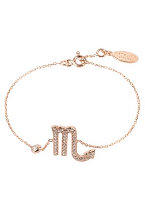 Rose gold bracelet with a delicate chain featuring a textured, rhinestone-embellished Scorpio symbol. Includes a small branded tag.
