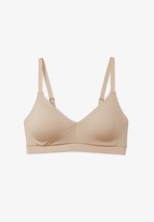 Lichtbeige, draadloze bh met een soepel oppervlak, driehoekige cups, verstelbare banden en een brede band voor ondersteuning.