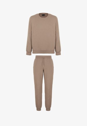 Set di felpa e pantaloni tuta beige, con colletto rotondo, polsini a costine e vita elasticizzata con coulisse sui pantaloni.