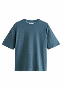 Kortærmet, teal t-shirt lavet af tekstureret stof. Har et diagonalt ribbet mønster og en rund halsudskæring. Lige snit, afslappet pasform.