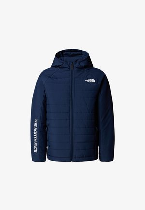 Laivastonsininen toppatakki, jossa on huppu, vetoketjusuljenta, The North Face -logo rinnassa ja hihassa sekä vaakasuorat tikkaukset.