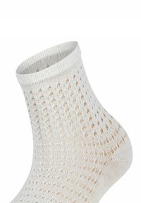 Witte enkelsok met een gestructureerd patroon, met opengewerkte diamanten en een geribde boord. Het materiaal ziet er lichtgewicht en ademend uit.
