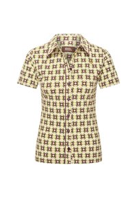 Camicia a maniche corte con colletto di un giallo chiaro, decorata con un motivo geometrico verde, viola e marrone. Chiusura con bottoni e forma leggermente sagomata.
