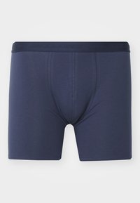 Dunkelmarineblaue Boxershorts aus weichem Stoff, mit einem gebrandeten Bund und einer engen Passform. Nahtdetails an der Vorderseite.