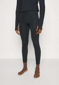 Czarne legginsy sportowe wykonane z elastycznego materiału o gładkiej teksturze. Posiadają średni stan w pasie oraz płaskie szwy dla większej wygody.