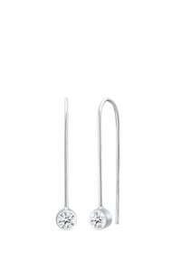 Boucles d'oreilles en argent avec un long design en crochet et une accent en pierre précieuse transparente et ronde à la base. Finition métallique lisse, style minimaliste.