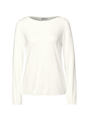T-shirt à manches longues et col rond en blanc uni. Fabriqué en tissu léger avec une texture lisse. Poignets extensibles et design à coupe décontractée.