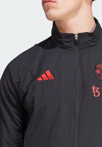 adidas Performance MANCHESTER UNITED TIRO 23 PRESENTATION TRACK - Equipación de clubes - schwarz