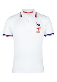 Hvid polo skjorte lavet af bomuld, med røde og blå striber på kraven og ærmerne, samt et marineblåt USPA-logo på venstre bryst.