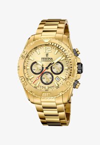 Atlasīts, gold coloured