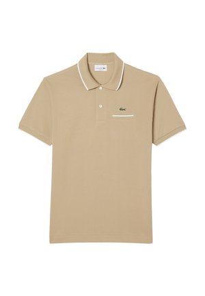 Beige-pohkakylpyr sytäntoid Ekkien pehmoräkkide. Varustettu kauluksella, kahden napin kiinnityksellä ja valkoisella reunuksella. Rinnassa brodeerattu vihreä logo.