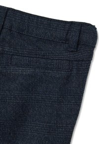 Dunkelblaue Wollhose mit einem strukturierten Hahnentritt-Muster, einem schlichten Bund und einer dezenten Gesäßtasche.