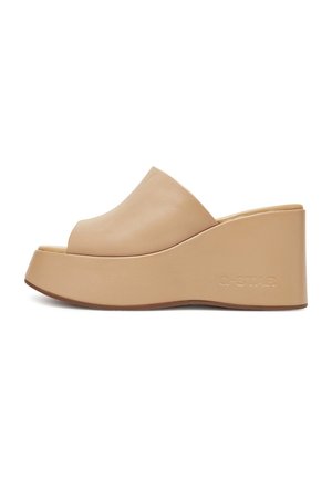 Bež kožne platforme sa klinom, otvorenog prsta i ugraviranim G-STAR logom na debelom đonu, prikazano u bočnom profilu.