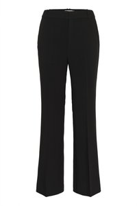 Schwarze, maßgeschneiderte Hosen mit geradem Bein, mit glatter Textur und mittlerer Leibhöhe. Keine sichtbaren Verschlüsse oder Muster.