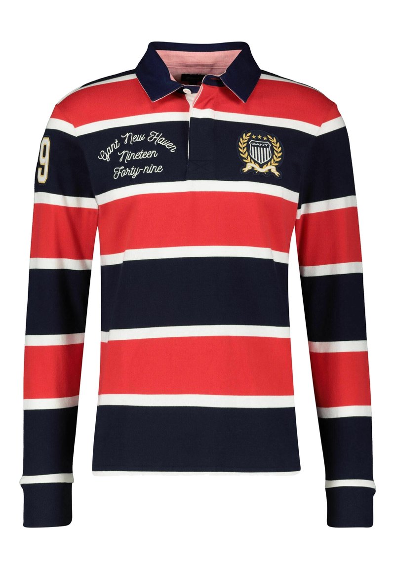 Langarm-Poloshirt in Rot, Marineblau und weißen Streifen. Mit einem marineblauen Kragen, bestickten Details und einer Rugby-Style Knopfleiste.