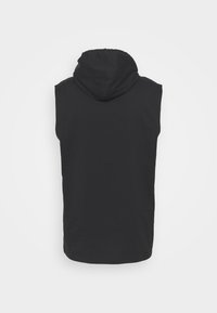 Black sleeveless hoodie with a hood, made of soft fabric, featuring a round hem and stitching along the armholes and shoulders.