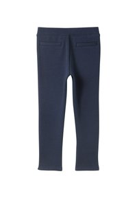 Leggings de color azul marino hechos de una tela elástica, con dos bolsillos traseros y un diseño ajustado con una textura suave.