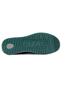 Suela de zapato de goma en color verde azulado con textura acanalada, que presenta un logo circular y el texto en relieve "WALK IN PITAS" sobre una superficie plana.