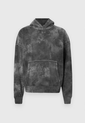 Tumehall pullover-sviiter, millel on tekstuuriga muster. Omab esitaskut, reguleeritavat kapuutsi ja kontrastset õmbluste detaili.