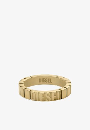 Gold-tone metal ring featuring a textured band with flat segments and "DIESEL" engraved on the front and inside.
