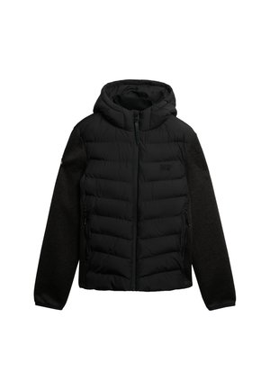 Puffjacke mit Kapuze, bestehend aus einer schwarzen gesteppte Vorderseite und dunkelgrauen gestrickten Ärmeln. Mit Reißverschluss und seitlichen Taschen.