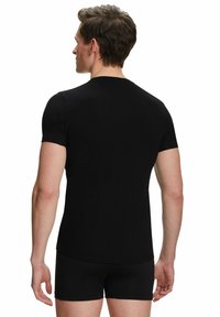 FALKE Daily Climate Control Outlast® Round Neck - Undershirt - black