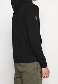 New Era Klubbkläder - black