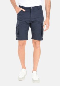 Pantaloni cargo navy in cotone con due grandi tasche laterali e una vestibilità dritta. Dotati di chiusura con bottone e passanti per cintura.