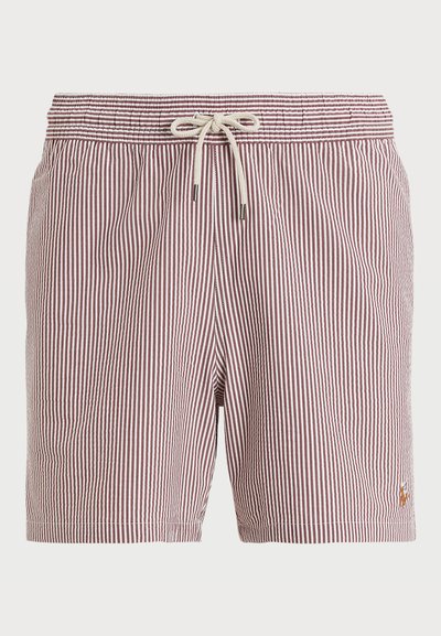 Raudoni ir balti dryžuoti maudymosi šortai su raišteliu juosmenyje, pagaminti iš lengvos medžiagos, su mažu logotipu apatinėje pusėje.