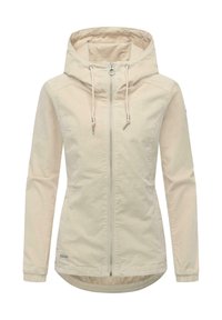 Ljusbeige jacka i mjukt, slätt tyg. Har blixtlåsförsedda framstycke, justerbar huva med dragsnören och långa ärmar med elastiska muddar.