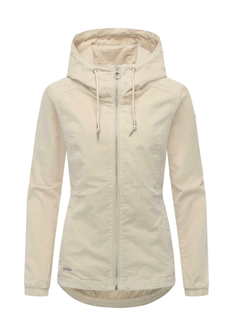 Ljusbeige jacka i mjukt, slätt tyg. Har blixtlåsförsedda framstycke, justerbar huva med dragsnören och långa ärmar med elastiska muddar.