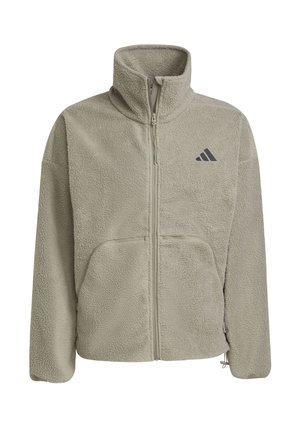Veste en polaire de couleur vert clair avec un col montant, une fermeture éclair, deux poches avant et un logo gris sur la poitrine gauche. Tissu doux et texturé.