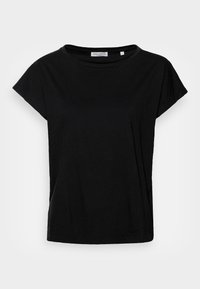 Camiseta negra de manga corta hecha de algodón suave. Presenta un cuello redondo y un ajuste relajado con un diseño minimalista y sin patrones.