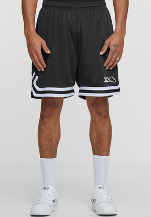 Crne košarkaške kratke hlače s bijelim trakama na rubu, izrađene od mrežaste tkanine, s elastičnom waistband-om i detaljem s logotipom sa strane.