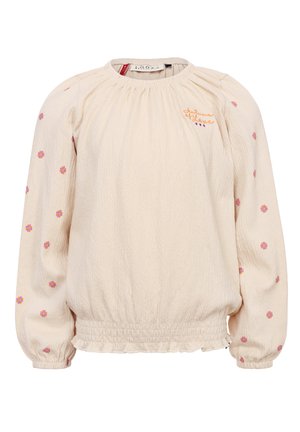 Crèmekleurige blouse van textuurstof, met pofmouwen en bloemenborduursel in roze en paars op de mouwen. Geraffineerde zoomafwerking.