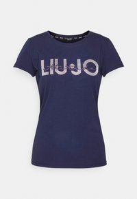 Mörkblå T-shirt med kort ärm och rund halsringning, med "LIU JO"-logotyp i vita och rosa prickar över bröstet.